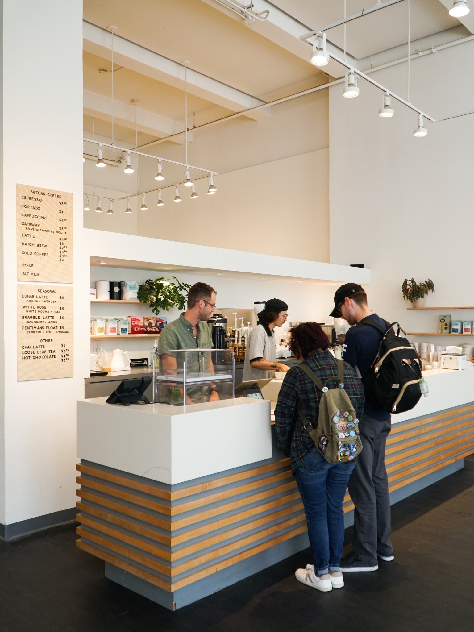 Customers ordering at the counter.